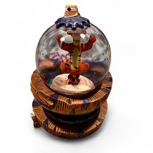 Charming Tigger Snow Globe with Orange and Black Accents